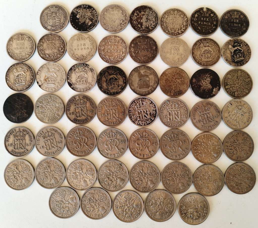 Britania / Great Britain coin lot in album (now minus the bronze pennies)