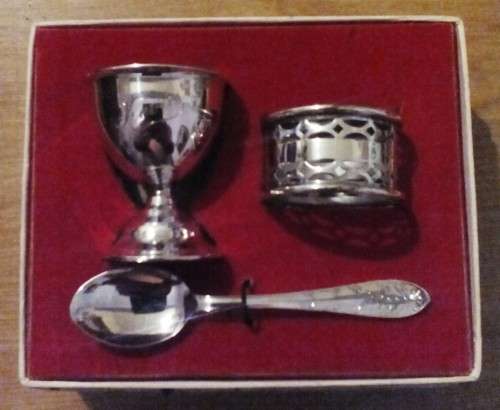 Silver plated christening set. Egg cup, serviette ring and spoon