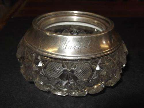 Cut glass powder holder with .925 silver hallmarked rim.