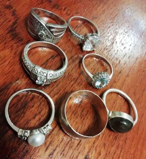 STERLING SILVER RINGS.