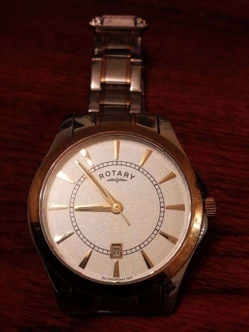ROTARY SWISS MEN'S WATCH. WORKING CONDITION.