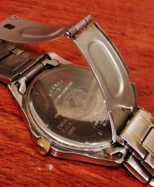 ROTARY SWISS MEN'S WATCH. WORKING CONDITION.