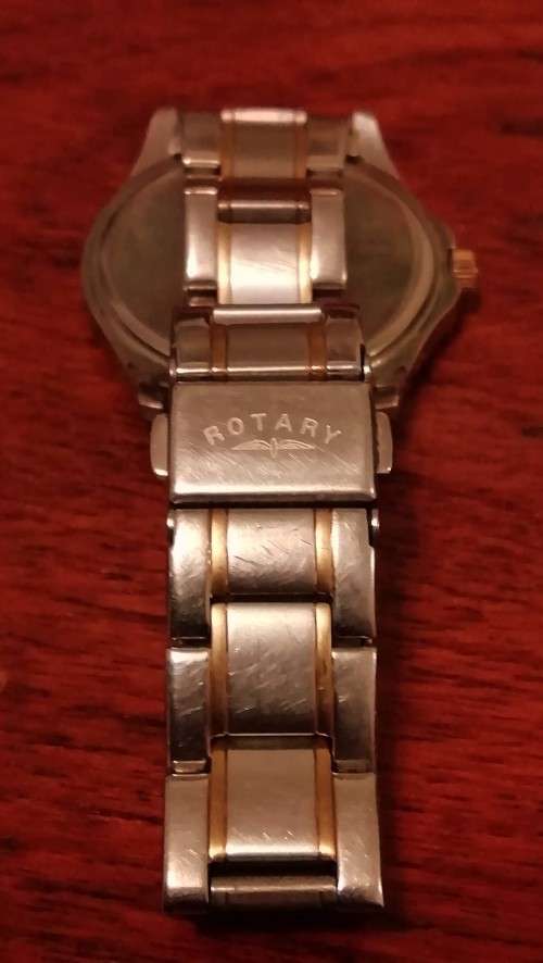 ROTARY SWISS MEN'S WATCH. WORKING CONDITION.