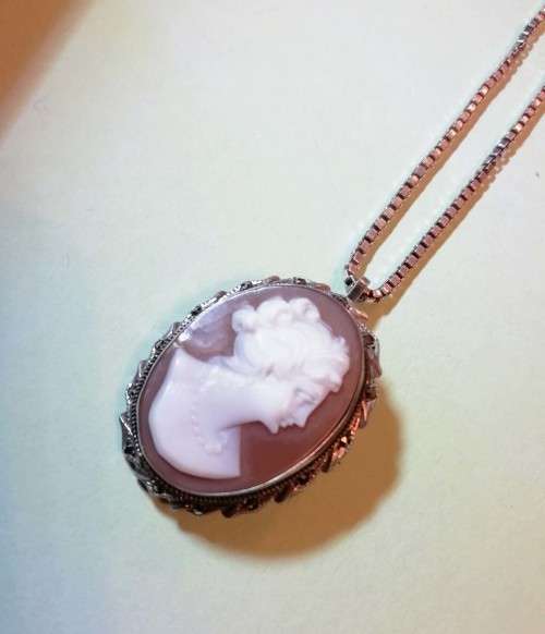 VINTAGE CAMEO PENDANT, SET IN 800 SILVER FRAME, AND SILVER CHAIN.