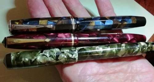 THREE FOUNTAIN PENS.