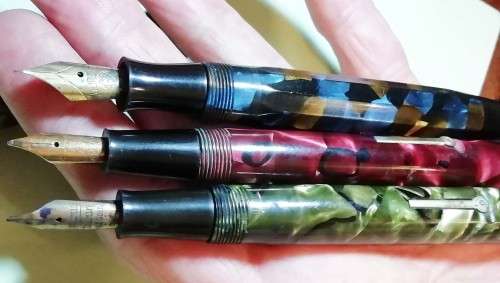 THREE FOUNTAIN PENS.