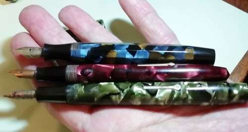 THREE FOUNTAIN PENS.