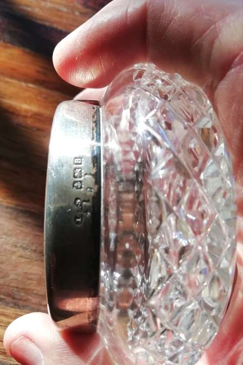 SILVER MIRROR AND CHRYSTEL GLASS CONTAINER WITH SILVER RIM.