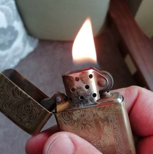 VINTAGE ZIPPO LIGHTER, AND LEATHER POUCH