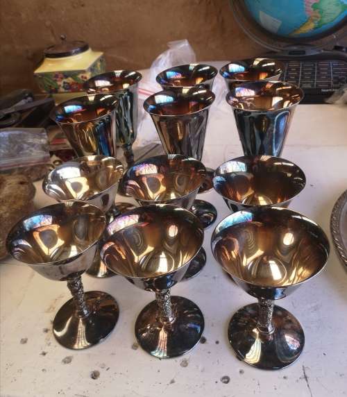 SET OF 12 SILVER PLATED GOBLETS AND TRAY.
