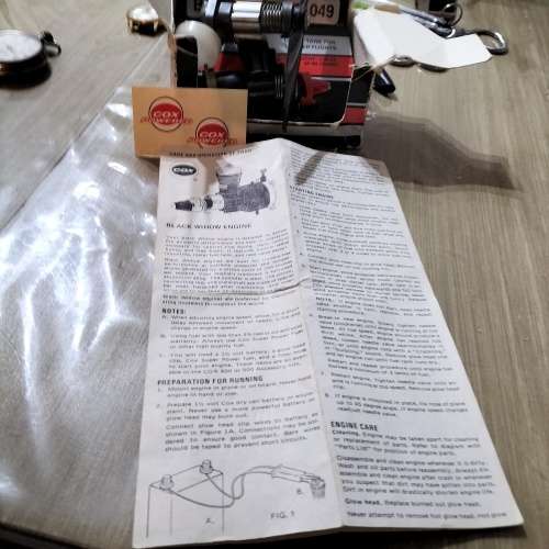 COX .049 MODEL AIRCRAFT ENGINE, BLACK WIDOW. AND ONE OTHER ENGINE.