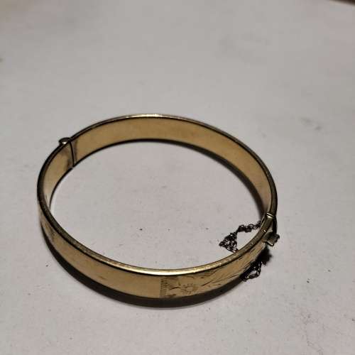 VINTAGE 1/5th 9CT GOLD METAL CORE BANGLE.