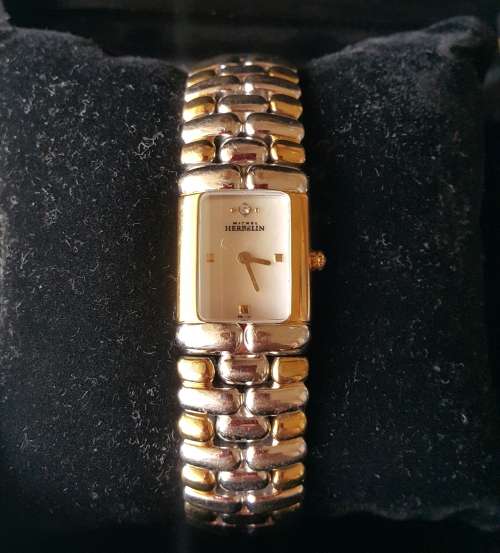 Michelle Herbelin two tone ladies watch   Retail  15500.00