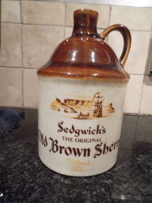 1982 circa 750ml Stoneware Jug Sedgwicks.
