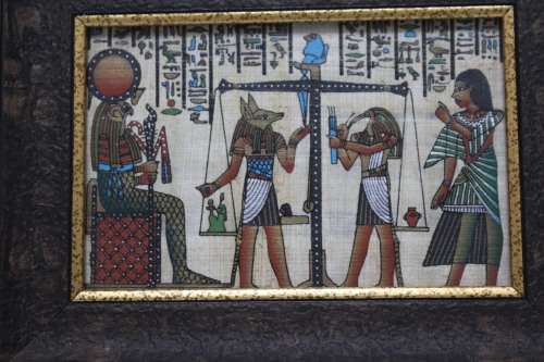 Framed Egyptian artwork on papyrus