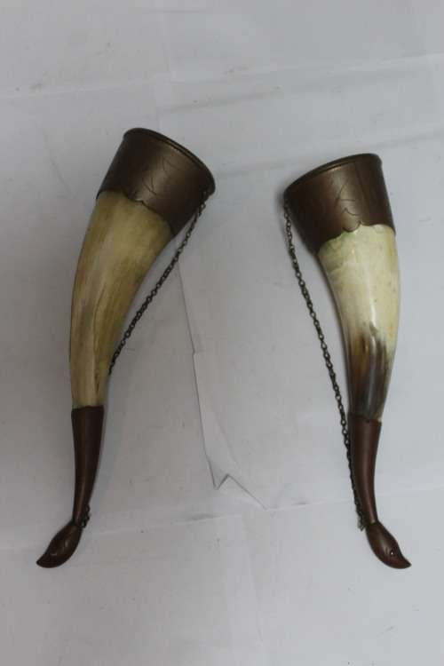 Antique horns to hold gunpowder for a rifle