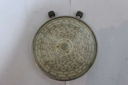 Vintage calculator in its pouch c/w instructions