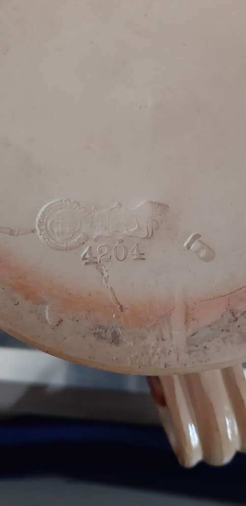 Royal Doulton big jub with a sterling silver trim