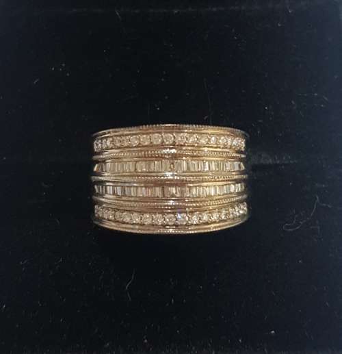 9ct White gold ring - with a combination of channel set round & baguette diamonds