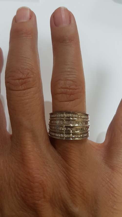 9ct White gold ring - with a combination of channel set round & baguette diamonds