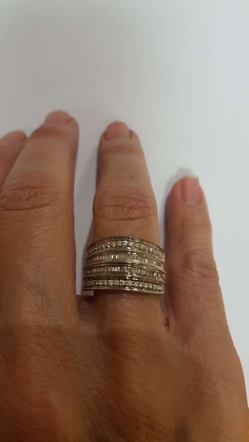 9ct White gold ring - with a combination of channel set round & baguette diamonds