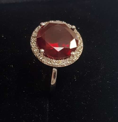 Garnet and diamond dress ring set in 9ct white gold