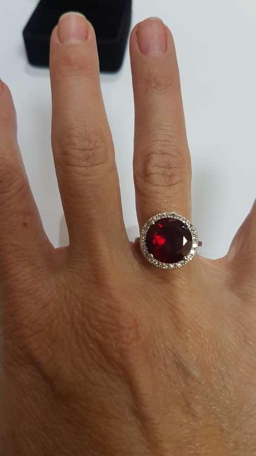 Garnet and diamond dress ring set in 9ct white gold