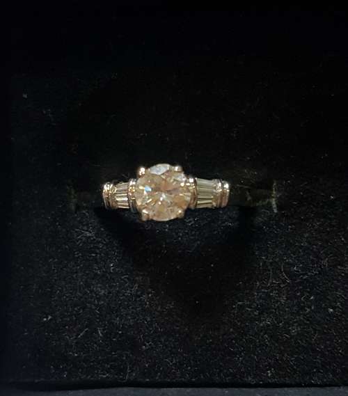 Platinum (10 grams) diamond engagement ring c/w 1/2 eternity band to match and valuation cert