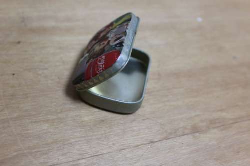 Collectible Coca-Cola memorabilia - small vintage container