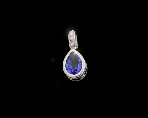 1.9 grams 14 carat White Gold Tanzanite and Diamond Pendant