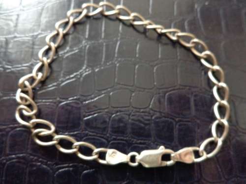 2 X BANGLES SILVER AND GOLD SEE SCANS READ ON.