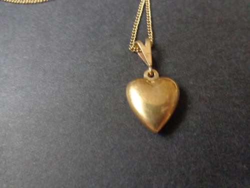 HEART NECLACE .SEE SCANS READ ON.