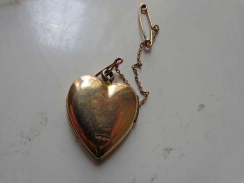 PLATED HEART ITEM WITH PIN SEE SCANS READ ON