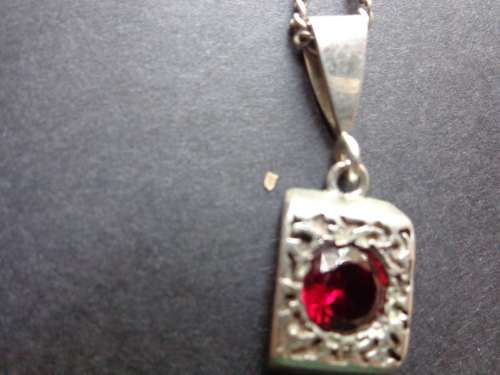 UNMARKED CHAIN WITH PENDANTSEE SCANS READ ON