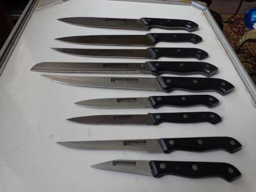 9 X MARKED KITCHEN KNIVES AS NEW.(JOBLOT).SEE SCANS READ ON.