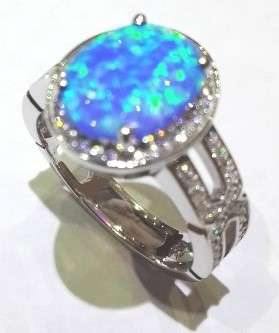 BLUE OPAL RING SET IN 925 STERLING SILVER