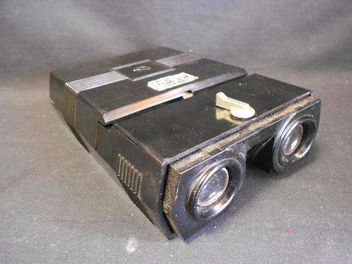 Burke and James, Inc slide viewer, body are cracked - as per scan