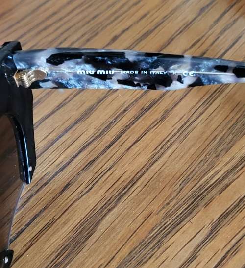 Miu Miu smu 02q Ladies Sunglasses. Made in Italy