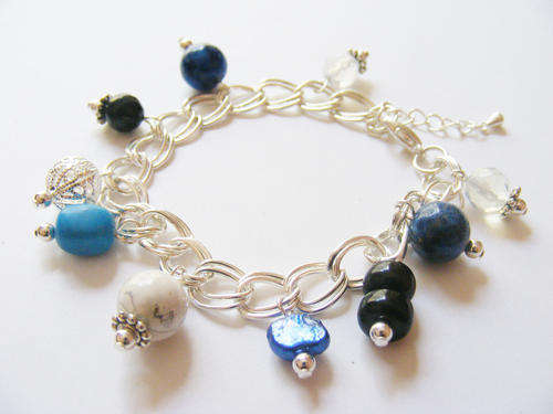 Stunning silver and gemstone charm bracelet!
