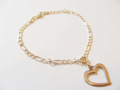 Sterling silver bracelet with sterling silver heart charm