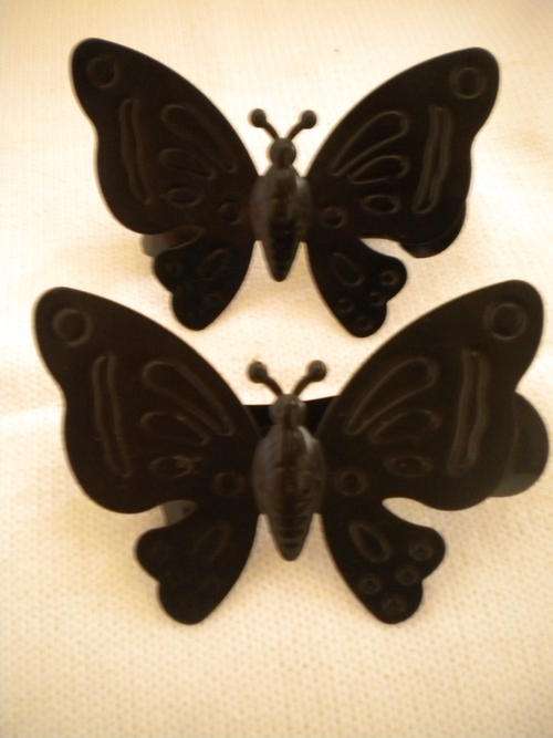 Butterfly metal curtain tiebacks