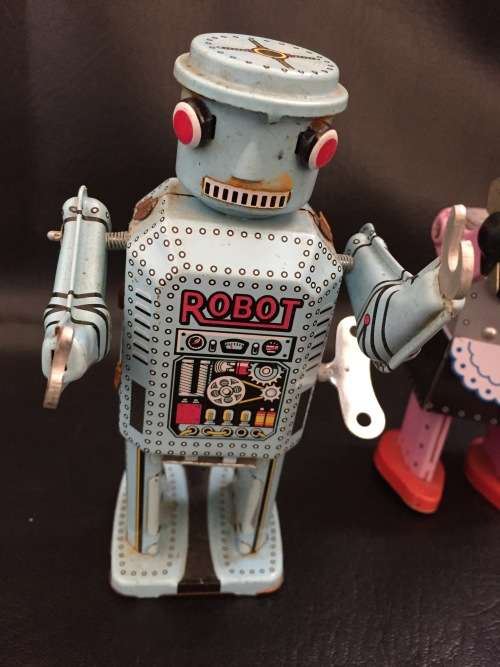 Tin metal wind up robots working bid for both!!!!