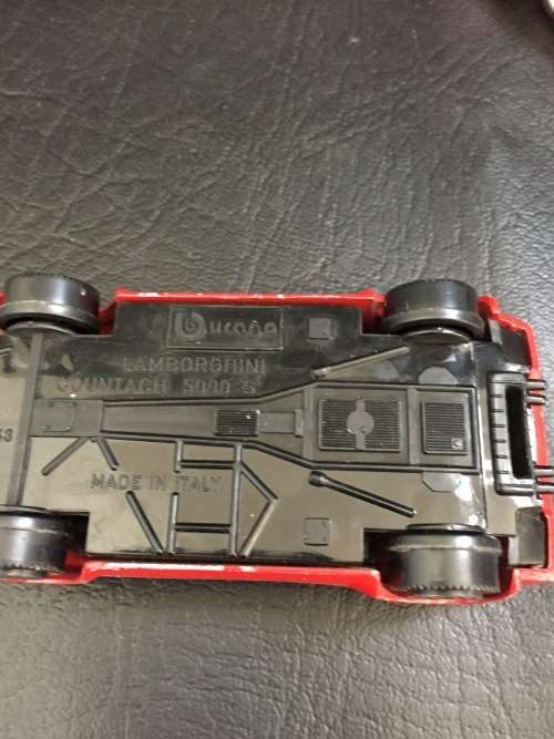 3 metal cars and 1 hard plastic Ferrari bid for all!!!!