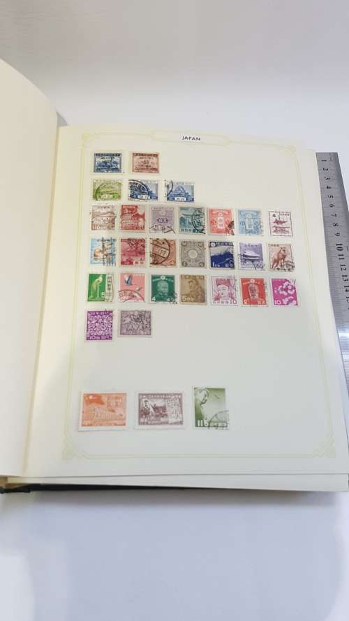 Large Stanley Gibbons stamp album full of stamps from all over the world!!!!!