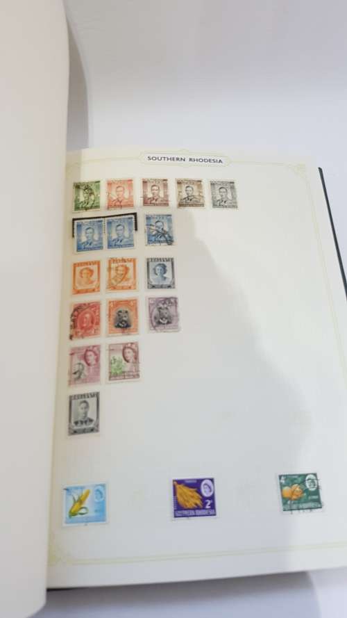 Large Stanley Gibbons stamp album full of stamps from all over the world!!!!!