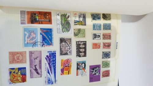 Large Stanley Gibbons stamp album full of stamps from all over the world!!!!!