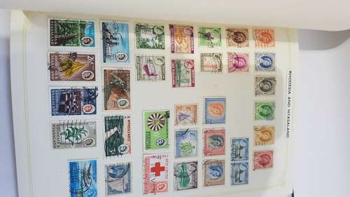 Large Stanley Gibbons stamp album full of stamps from all over the world!!!!!