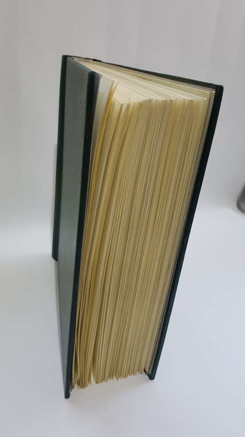 Large Stanley Gibbons stamp album full of stamps from all over the world!!!!!