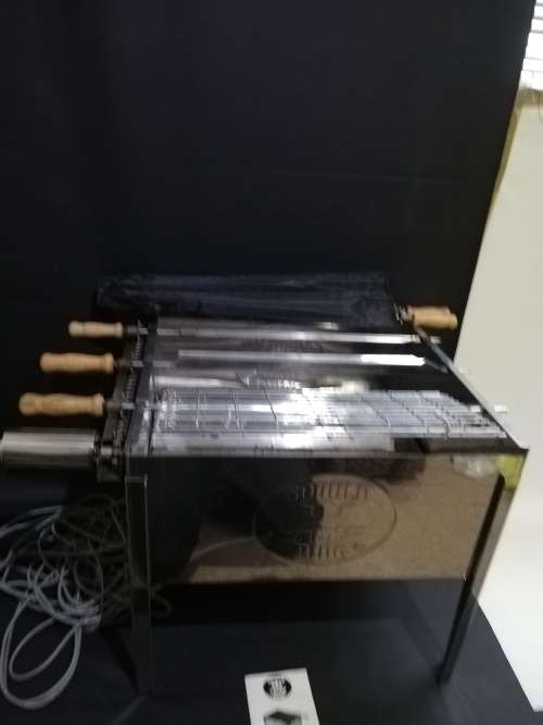 Large Stainless steel Souvla king Rotasary braai working in good condition complete with bag!!!!!!