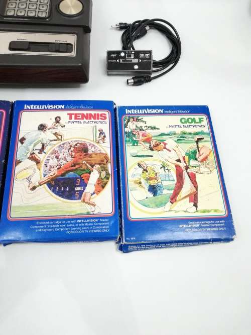 Rare intelivision console with boxed games working 100% compete!!!!